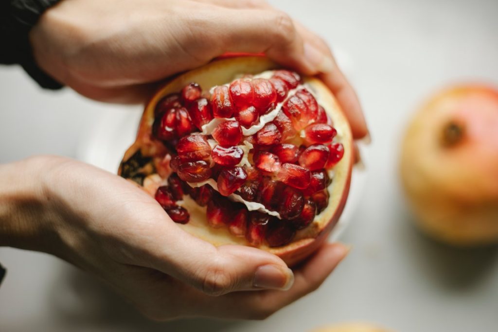 hands with pomegranate 1
