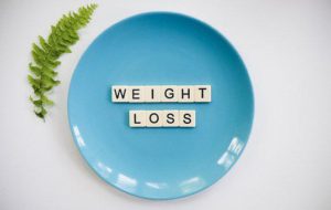 words weight loss on a plate